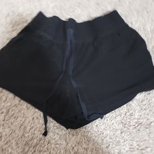 small black Andene shorts with drawstring.